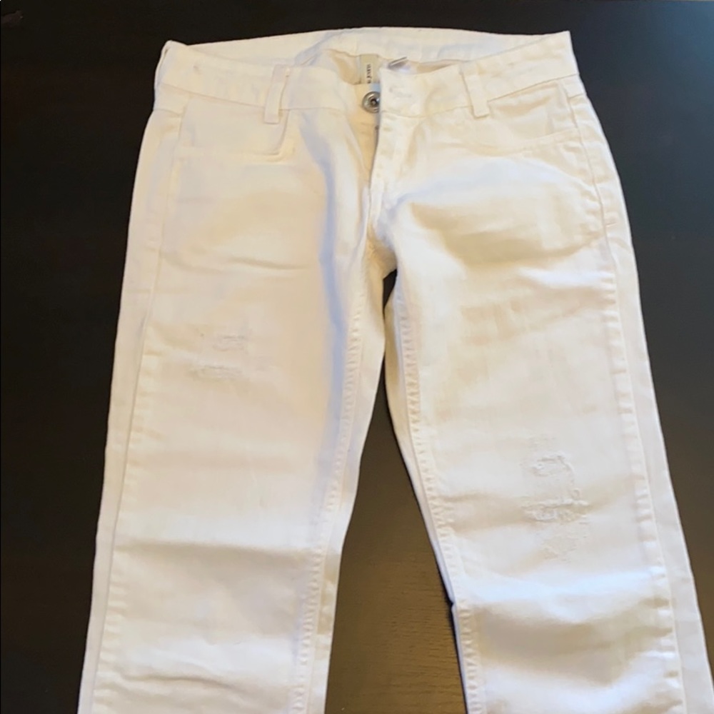 White slightly distressed jeans
